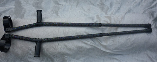 Chameloen Crutch has black iridescent coloured stones that shine like the Aurora Borealis