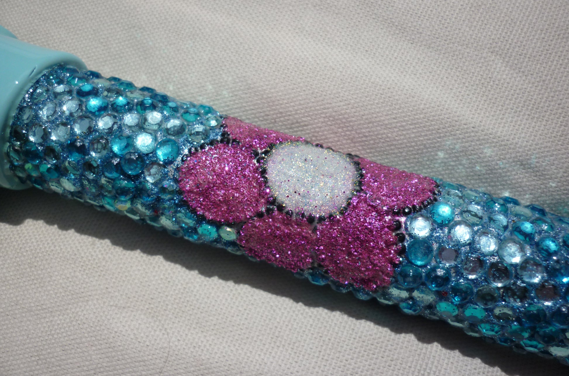 RaRa GlamStick Crutch with Dazzling Rhinestones the crutch in turquoise Rhinestones, A pink flower made by glitter
