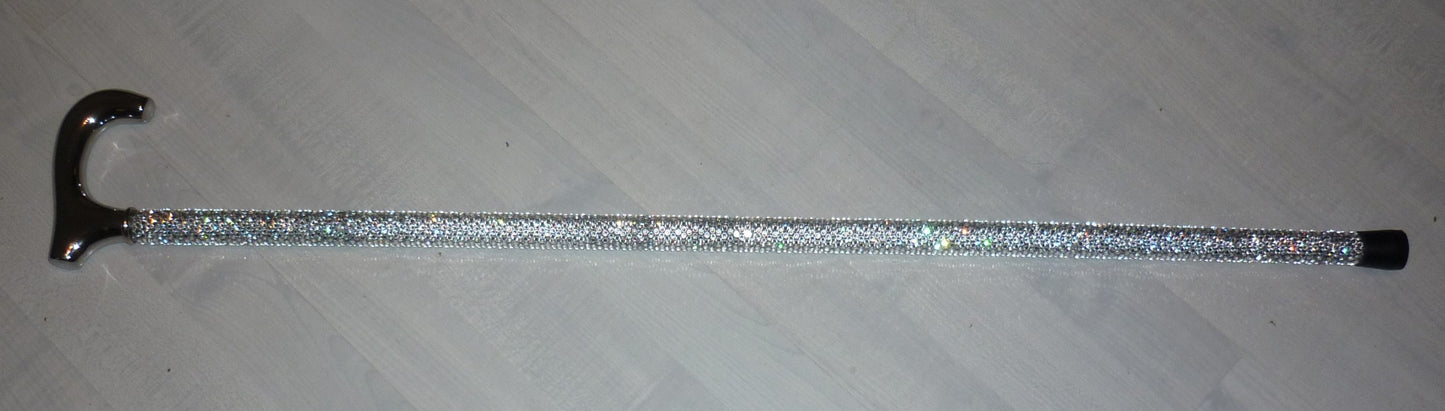 Austrian Crystal SparkleCane on a wood effect background.