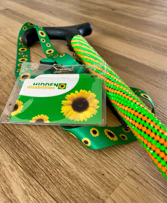 Helenix green and orange stick with sunflower lanyard