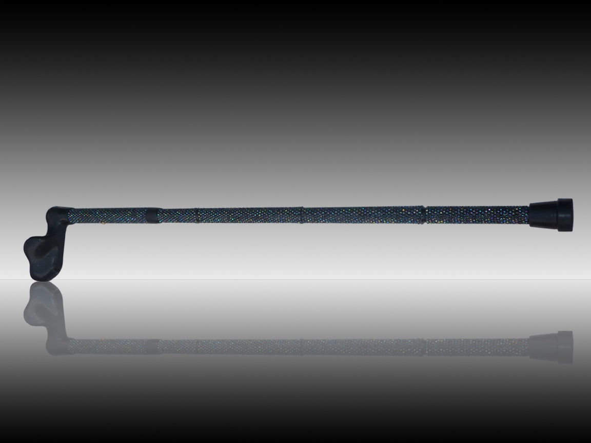Chameloen Crutch has black iridescent coloured stones that shine like the Aurora Borealis showing on a shiny background to give a reflection 