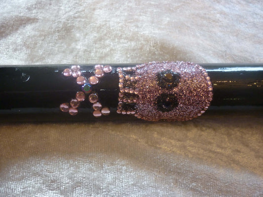 EMOtion Black Walking Stick with emo skull and a cross in pink glitter and diamanté around the outside. The cross has a blue diamanté in the middle.
