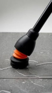 Flexyfoot Ferrules connected to bottom of a walking stick