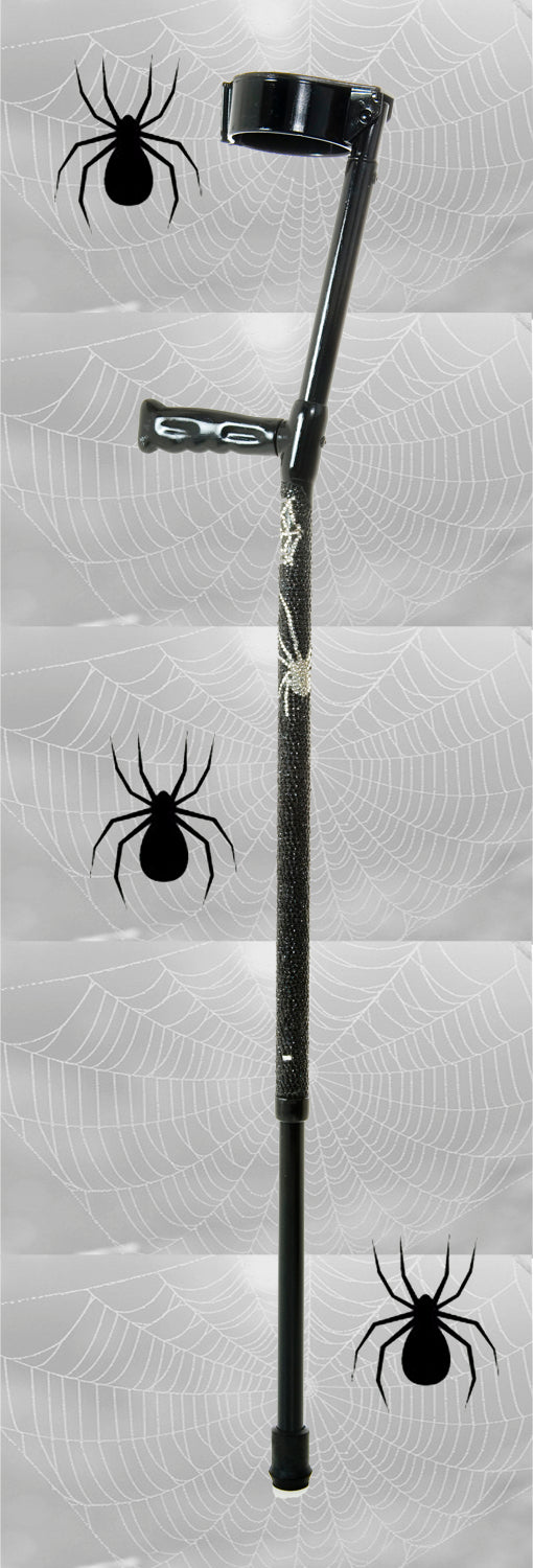 The Titchy Bitsy Spider Crutch on a grey backdrop with grey background with 3 large spiders